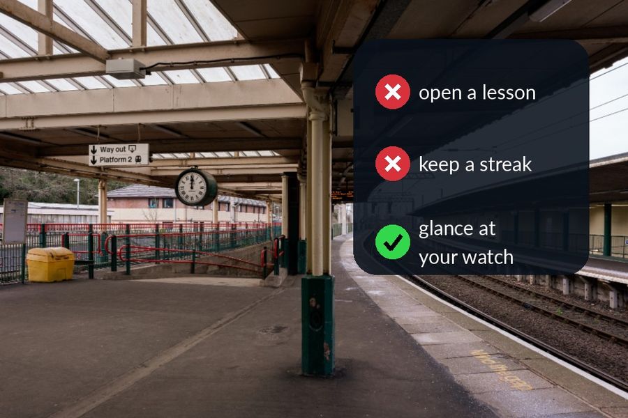 An empty train platform with the article's point over the sky: no lesson to open, no streak to keep, just a glance at your watch