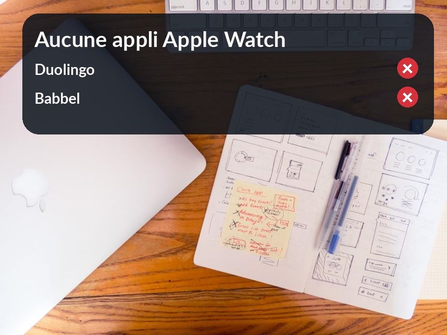 Sur la photo du bureau, un encart indique que ni Duolingo ni Babbel n'ont d'application Apple Watch