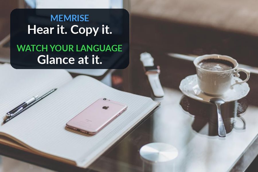 A desk with a notebook, phone and watch, with the post's point added: Memrise says hear it and copy it, Watch Your Language says glance at it