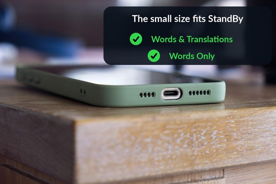 The phone charging flat on its side, with the point made above it: both the Words & Translations widget and the Words Only widget are built at the small size StandBy supports
