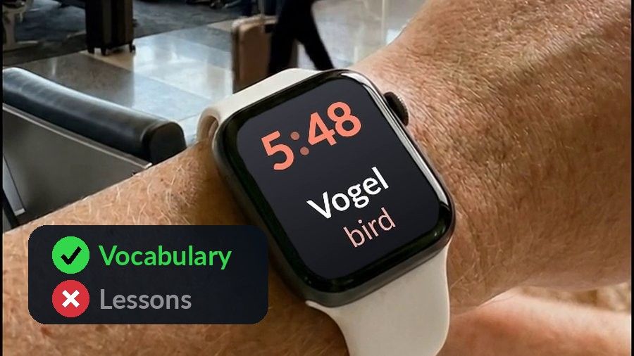 An Apple Watch at the airport showing Vogel (bird) at 5:48, tagged: vocabulary, not lessons