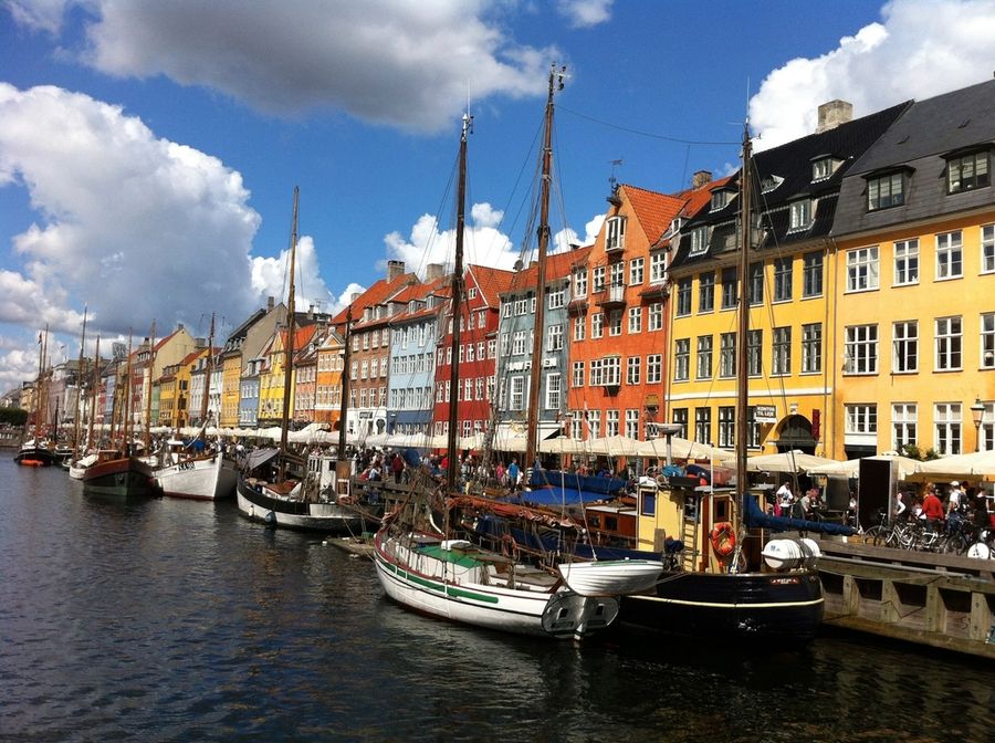 Colourful houses and old ships on Nyhavn canal in Copenhagen