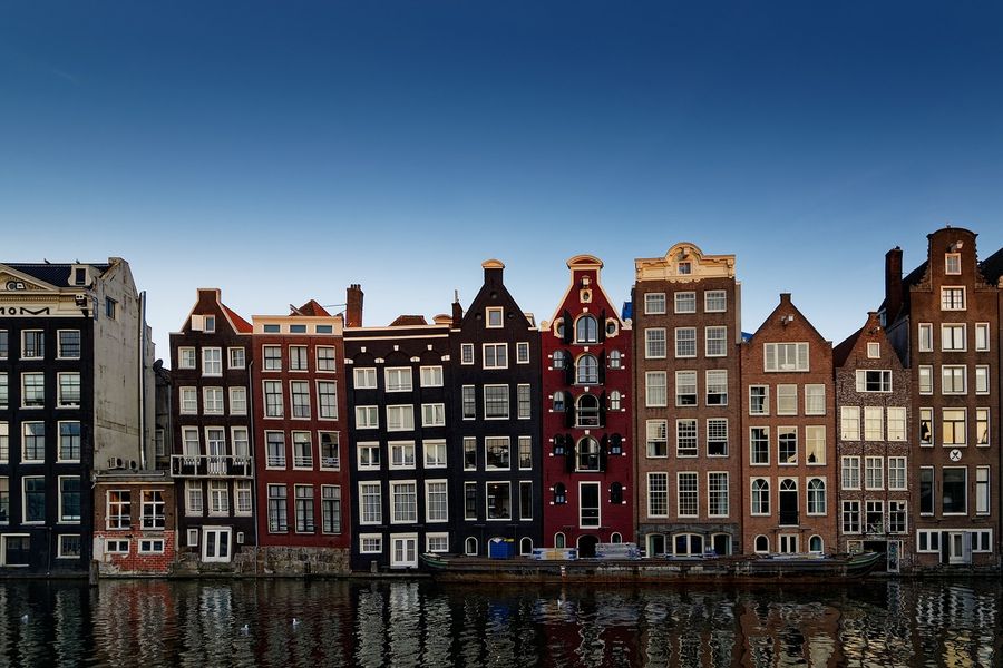 Canal houses along the water in Amsterdam