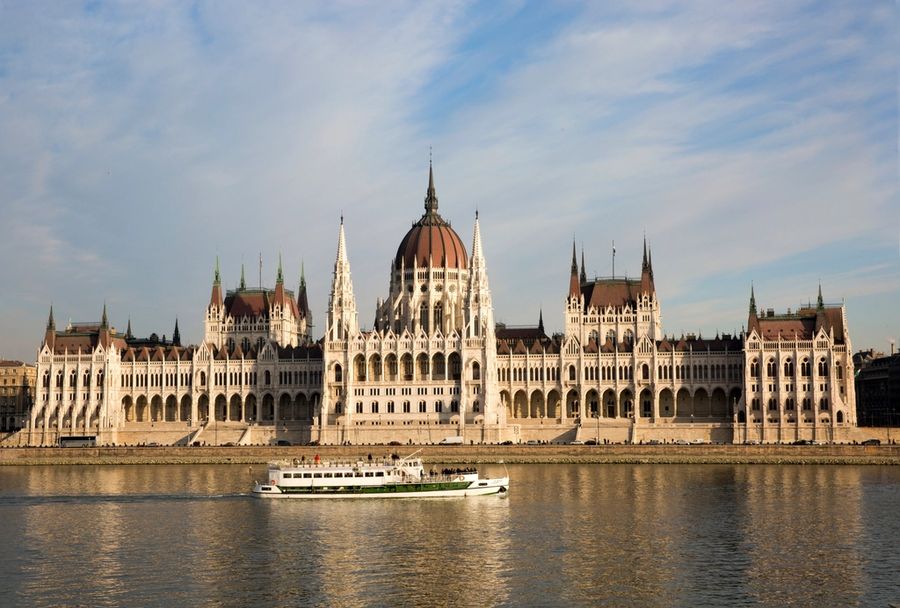 The Hungarian Parliament Building beside the Danube in Budapest in daylight
